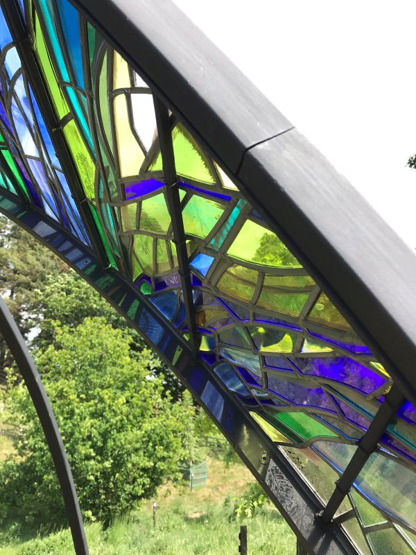 Stained glass in sunlight made by Emma Butler-Cole Aiken