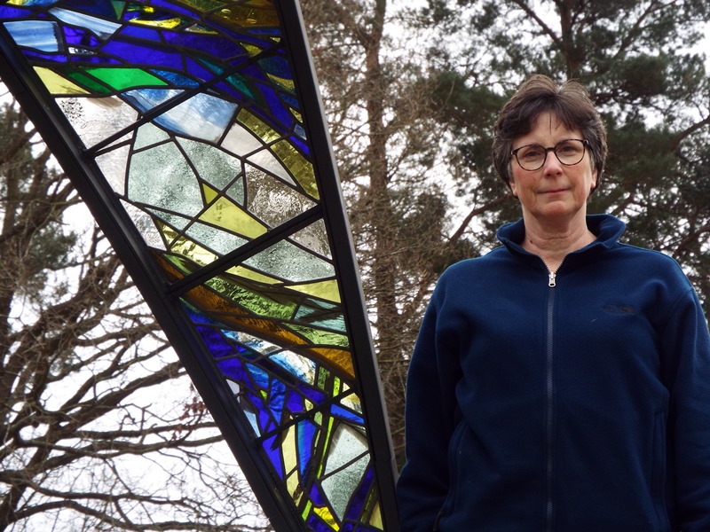 Emma Butler-Cole Aiken with her stained glass sculpture