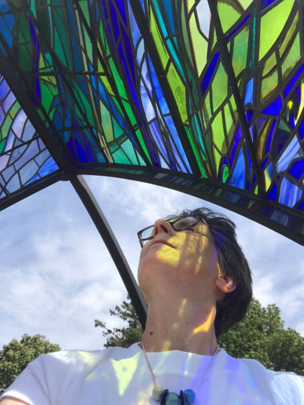 Sunlight shining through stained glass sculpture by Emma Butler-Cole Aiken