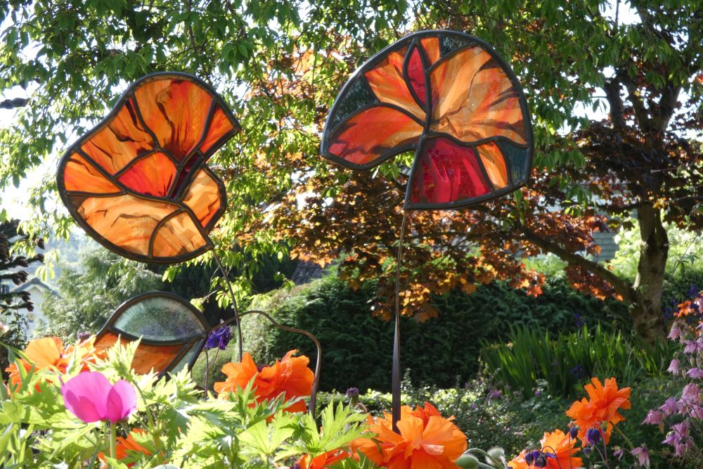 Group of stained glass poppies for the garden